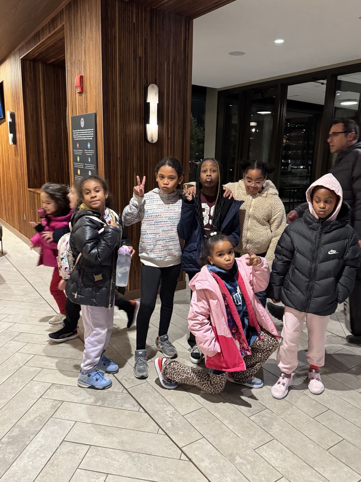 CLC girls posing together in the lobby at Disney on Ice
